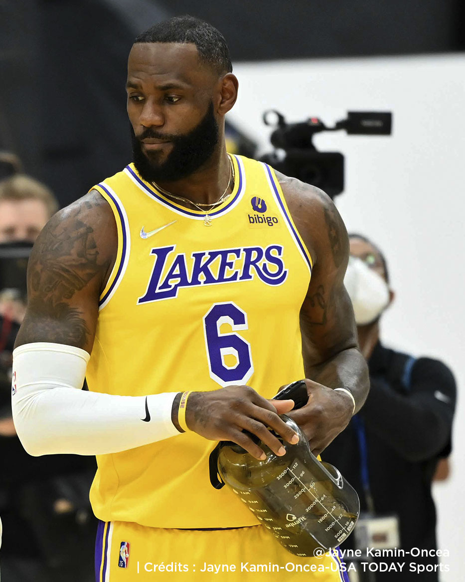 Los Angeles Lakers' LeBron James shares a laugh with staff members during the NBA basketball team's Media Day Monday, Sept. 26, 2022, in El Segundo, Calif. (AP Photo/Jae C. Hong)